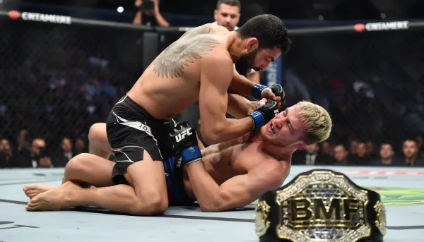 How Charles Oliveira's Ground Dominance Secured the BMF Title Against Max Holloway at UFC 326